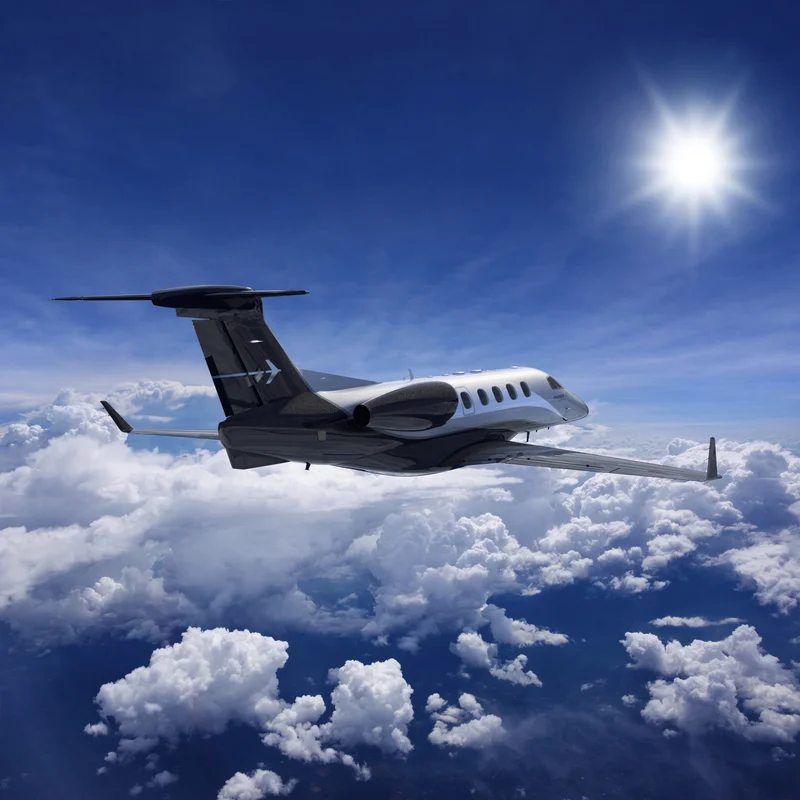 phenom 300 flying above the clouds